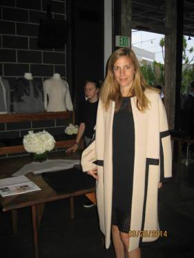 Pringle of Scotland's Rae Miles shows off some of this season's creations. Good to be wrapped up in Scottish woolies on a chilly Los Angeles evening!