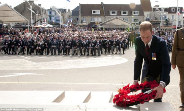 Prince William lays a wreath in honor of the fallen soldiers.