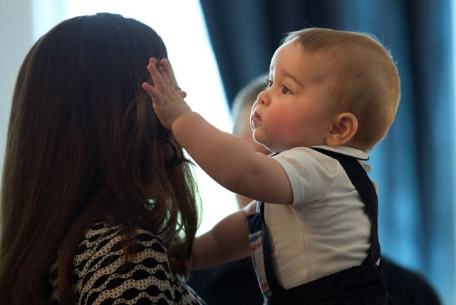 Fixing Mummy's hair. "All better mummy"