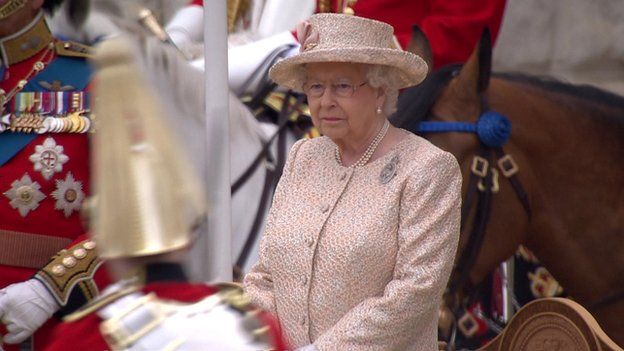 The Queen inspects the troops.
