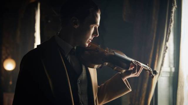Beautiful picture of the Cumberbabe and his violin.